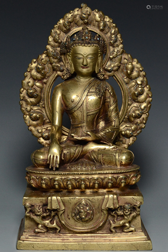 A MING DYNASTY GILT BRONZE FIGURE OF BUDDHA