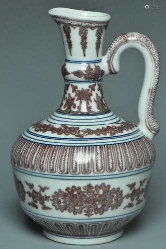 AN UNDERGLAZED RED EWER QIANLONG MARK AND PERIOD