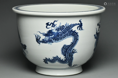 A BLUE AND WHITE DRAGON JARDINIERE