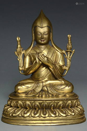 A QING DYNASTY GILT BRONZE FIGURE OF TSONGKHAPA