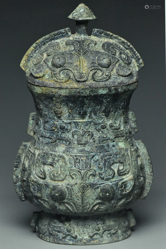 A BRONZE RITUAL WINE VESSEL ZHI