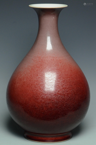 A QING DYNASTY COPPER RED VASE QIANLONG MARK