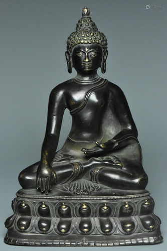 A YUAN DYNASTY BRONZE FIGURE OF BUDDHA