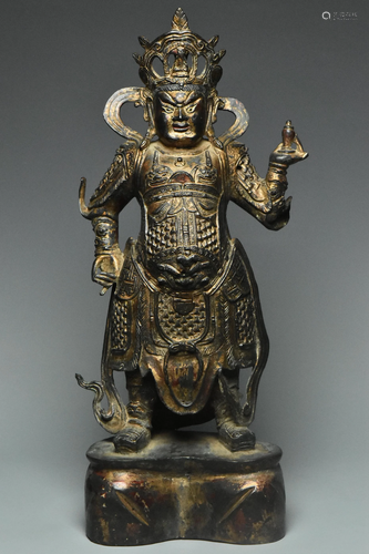 A MING DYNASTY GILT-LACQUERED BRONZE WEITUO