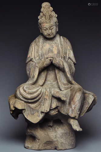 A SONG DYNASTY WOOD FIGURE OF GUANYIN