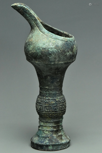 A SHANG DYNASTY BRONZE RITUAL WINE VESSEL GU