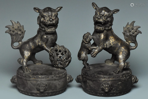 A PAIR OF BRONZE BUDDHIST LION QIANLONG MARK