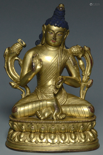 A YUAN DYNASTY GILT BRONZE FIGURE OF BUDDHA