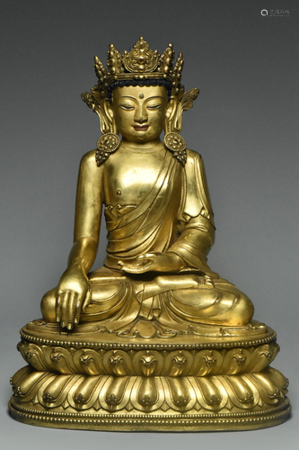 MING DYNASTY GILT BRONZE FIGURE OF BUDDHA 15TH C