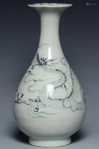 A BLUE AND WHITE DRAGON VASE