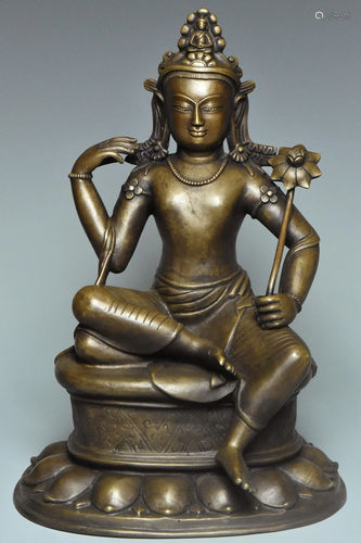 A YUAN DYNASTY BRONZE FIGURE OF MAITREYA