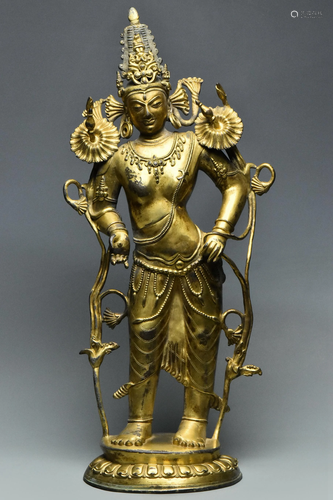 A LARGE GILT BRONZE AVALOKITESHVARA 13TH C