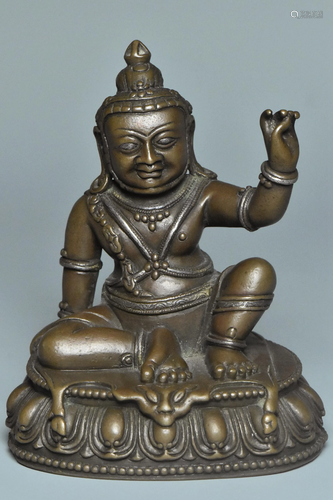 A YUAN DYNASTY SILVER-INLAID BRONZE JAMBHALA