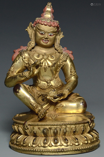 A GILT BRONZE JAMBHALA YONGLE MARK AND PERIOD