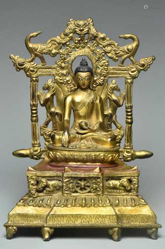 A YUAN DYNASTY GILT BRONZE FIGURE OF BUDDHA