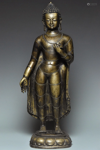 A LARGE YUAN DYNASTY BRONZE FIGURE OF BUDDHA