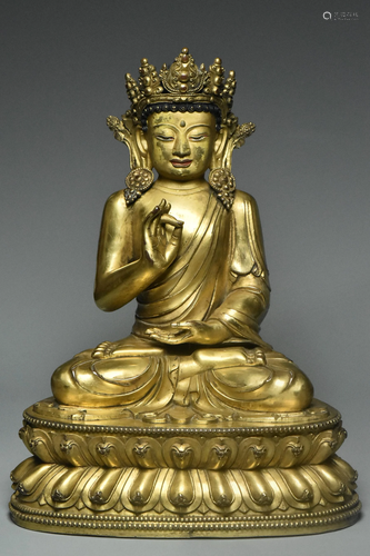 MING DYNASTY GILT BRONZE FIGURE OF BUDDHA 15TH C