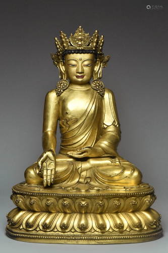 MING DYNASTY GILT BRONZE FIGURE OF BUDDHA 15TH C