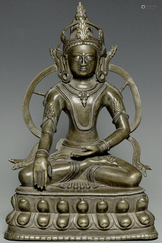 A SILVER-INLAID BRONZE CROWNED BUDDHA 14TH C