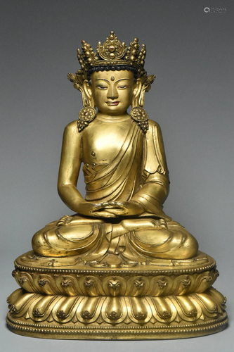 MING DYNASTY GILT BRONZE FIGURE OF BUDDHA 15TH C