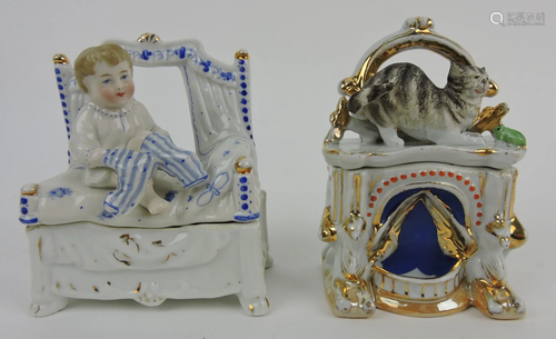 Porcelain lot of 2 faring trinket boxes