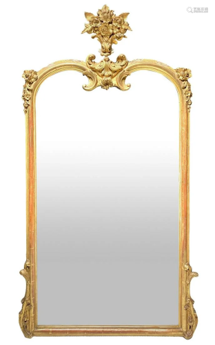 Mirror in gilded wood with molding at the center. Late