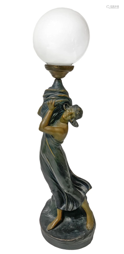 Lamp with casting sculpture depicting Liberty costume,