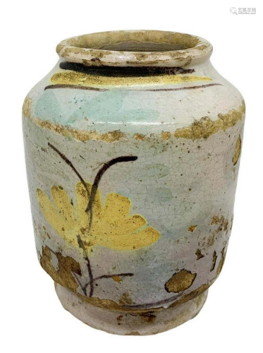Cylinder white body with yellow floral decorations on
