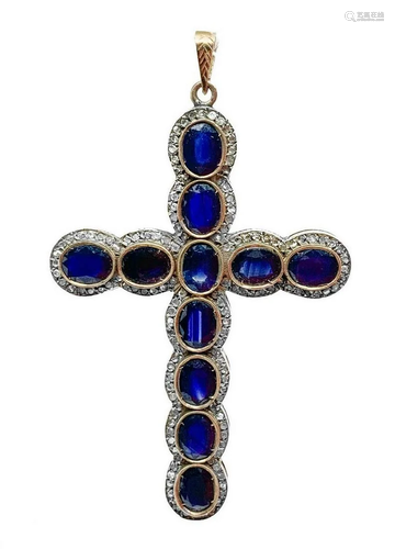 Gold Cross 9 K and silver with blue sapphires and