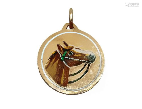 Round gold pendant with horse head