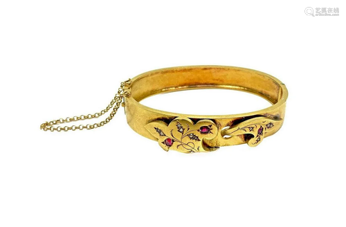 Yellow gold bracelet with gold elements applied rubies