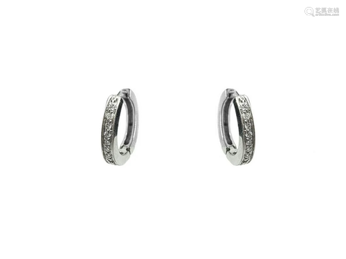 Hoop earrings in white gold with diamonds. Gr 4.7.