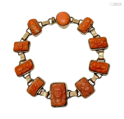 Bracelet in coral, with 11 miniatures depicting faces