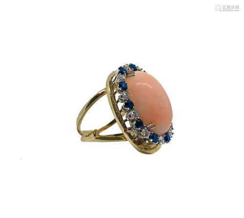 Yellow gold ring with pink coral Deep sea oval and