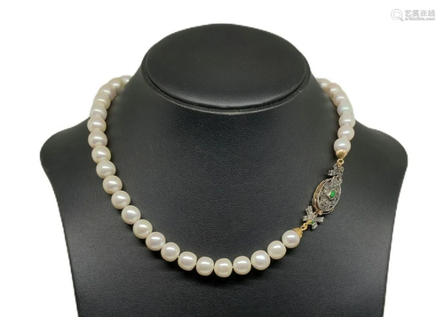 Pearl Necklace 42 cal. 11-11 Â½ susta in gold and