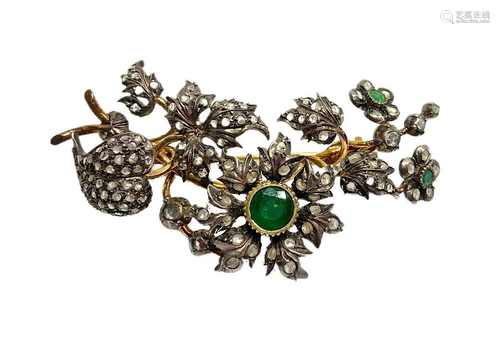 Brooch with flowers and leaves in gold and silver with