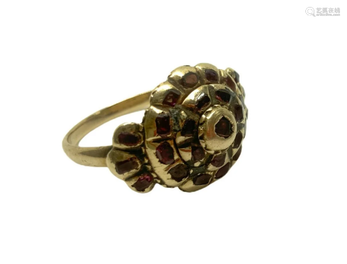 Ring low titer with rosette with slivers of rubies