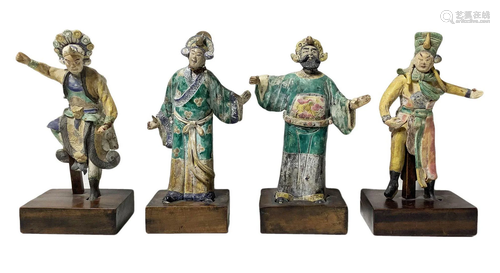 Group of four ancient statues representing Chinese