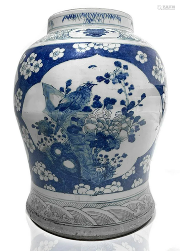 Vase with floral decoration and birds in blue and white