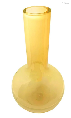 iridescent glass vase in shades of straw yellow,