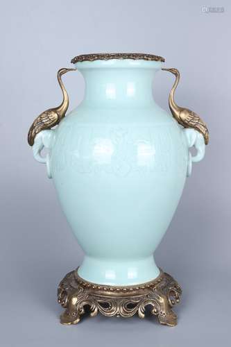 chinese celadon glazed porcelain pot with taotie pattern