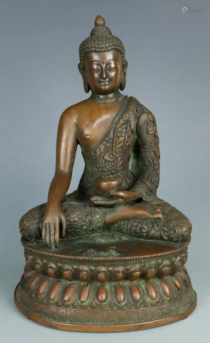 A Buddha bronzefigure statue