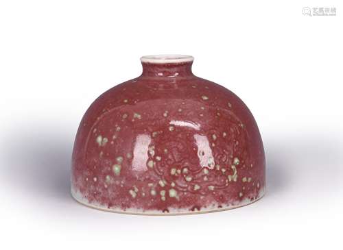 A red glazed porcelain zun