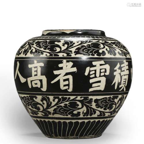 An inscribed black glazed flower porcelain jar