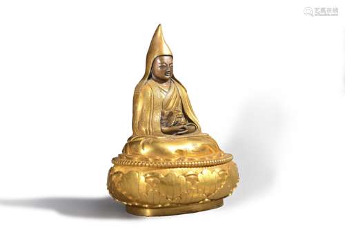 A gilding copper sitting Tsongkhapa statue