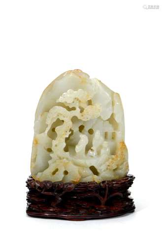 A white jade carved figure ornament