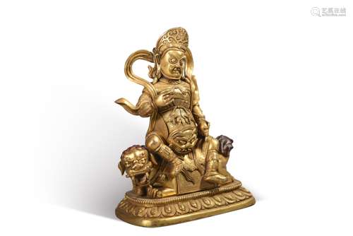 A gilding copper sitting yellow Jambhala statue