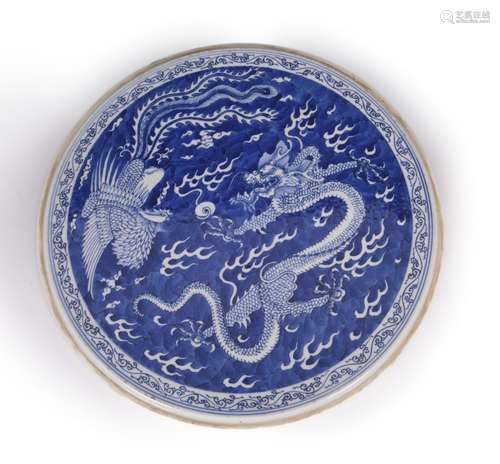 A blue and white dragon and phoenix porcelain plaque