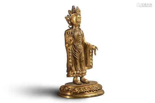 A gilding copper standing buddha statue