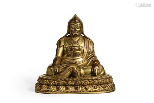 A gilding copper sitting buddha statue